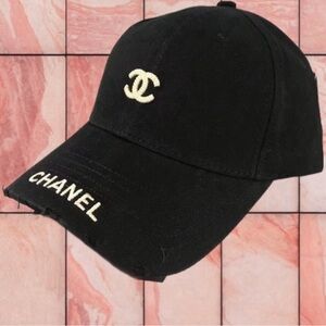 CHANEL Black Cap with Cream Logo and Embroidered Brim